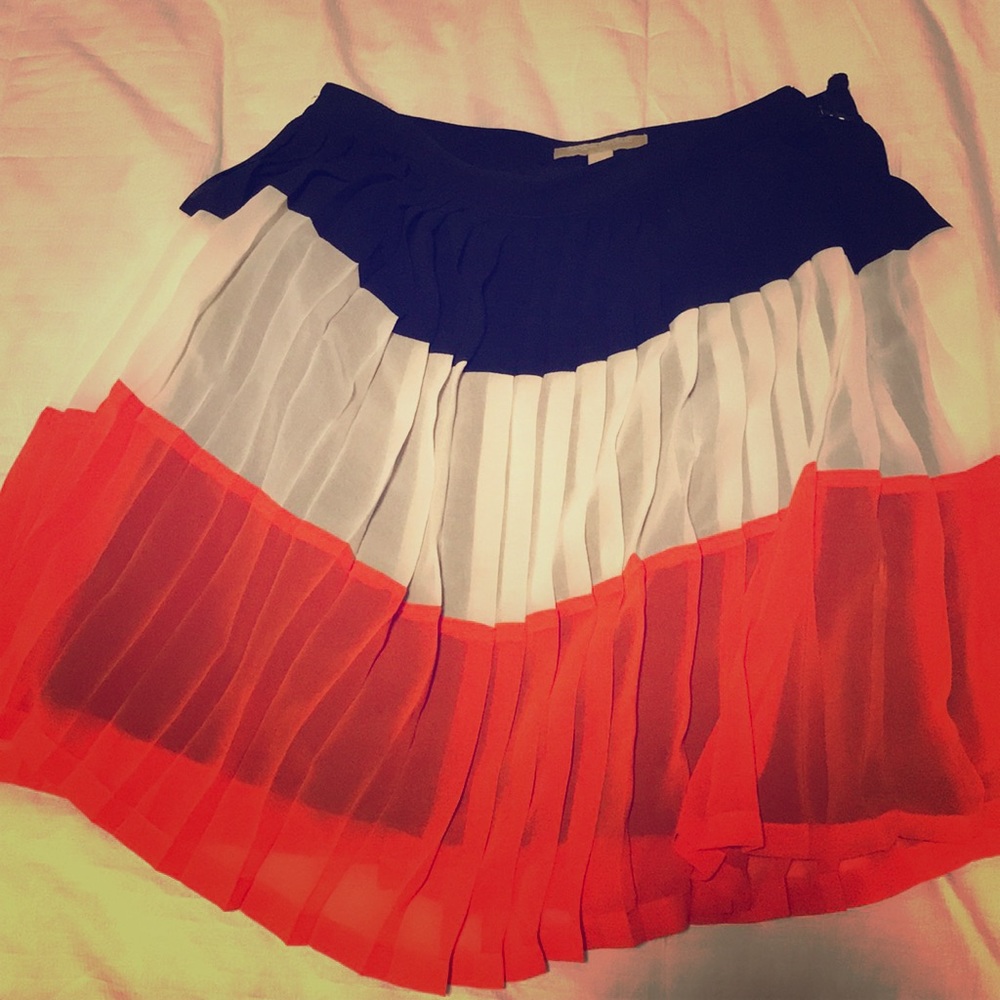Orange, white, and blue striped skirt.